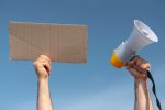 activists-marching-together-with-megaphone