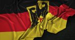 germany-flag-wrinkled-dark-background-3d-render