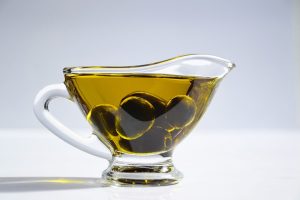 Επιχείρησε να στείλει αρχαία νομίσματα στη Γερμανία κρυμμένα σε… ελαιόλαδο