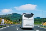 white-tourist-bus-road-poland-travel-concept