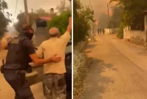 Συγκλονιστικά πλάνα: Αστυνομικοί εκκενώνουν σπίτια στην Μάνδρα λίγο πριν τα «καταπιούν» οι φλόγες