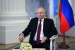 Russian President Vladimir Putin attends an interview with China Media Group