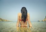 Woman bathing in the sea