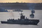 A fleet of 15 navy ships enter Sydney Harbour