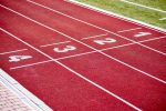 Photo athletics track lane numbers red race track