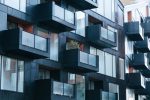 Photo contemporary black building exterior wit balconies