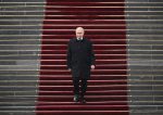Putin is going down the stairs in Kremlin