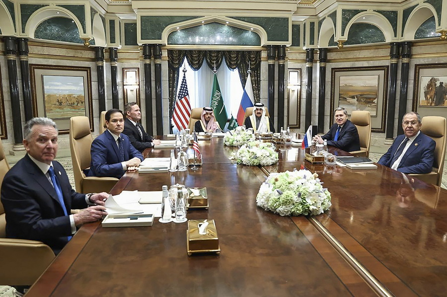 A handout photo made available by the Russian Foreign Ministry Press Service shows Russian Foreign Minister Sergey Lavrov and Russian presidential aide Yury Ushakov attending a meeting with US Secretary of State Marco Rubio, US National Security Advisor Mike Waltz and US Middle East envoy Steve Witkoff, Saudi Foreign Minister Prince Faisal bin Farhan Al Saud and Saudi National Security Advisor Mosaad bin Mohammad Al-Aiban at Diriyah Palace in Riyadh, Saudi Arabia