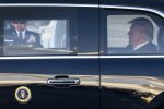 US President Donald J. Trump is seated in the United States presidential state car, also referred to as 'The Beast'
