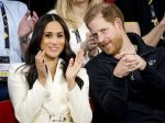 Prince Harry, Duke of Sussex (R) and his wife, Meghan, Duchess of Sussex
