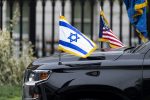 Two flags on a car