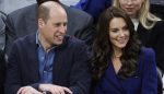 Britain's William, Prince of Wales (L) and his wife Catherine