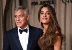 US actor George Clooney (L) and his wife, lawyer Amal Clooney