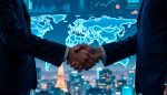 Business handshake with world map background