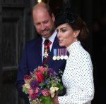 Britain’s Prince William (L), the Prince of Wales and Catherine (