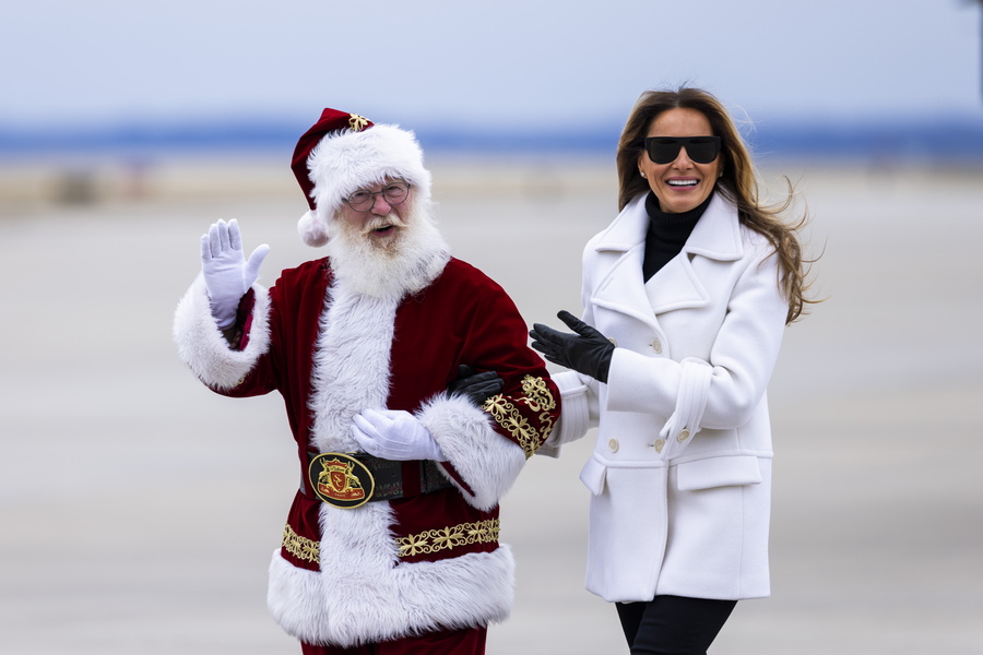 US First Lady Melania Trump and Santa Claus