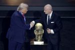 US President Donald Trump receives the FIFA Peace Prize from FIFA President Giovanni Infantino
