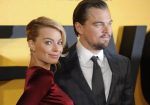 Margot Robbie and US actor/cast member Leonardo Di Caprio