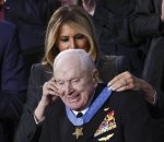 Retired Navy Captain E. Royce Williams receives the Medal of Honor from First Lady Melania Trump