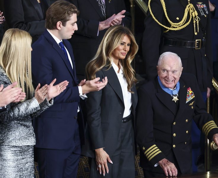 Retired Navy Captain E. Royce Williams (R) receives the Medal of Honor from First Lady Melania Trump