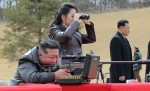 North Korean leader Kim Jong Un (L) firing a new-type sniper rifle while his daughter Kim Ju Ae (2-L) looks on at an undisclosed shooting range in North Korea, 27 February 2026 (issued 28 February 2026). According to KCNA, Kim met with major leading cadres and military commanding officers at the Party Central Committee