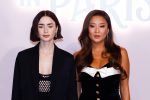 ritish-US actress Lily Collins (L) with US actress Ashley Park