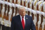 Donald Trump inspects an honour guard