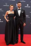 Serbian tennis player Novak Djokovic (R) and his wife Jelena Djokovic