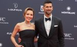 Serbian tennis player Novak Djokovic (R) and his wife Jelena Djokovic