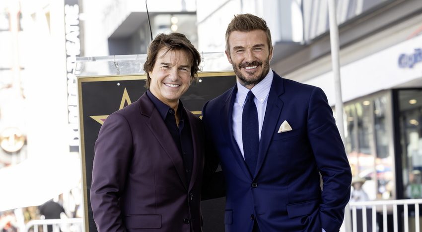 British former soccer player David Beckham (R) poses with US actor Tom Cruise (L)