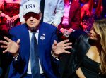 US President Donald Trump (L) gestures next to first lady Melania Trump (R