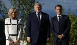 French President Emmanuel Macron (R) and his wife Brigitte Macron (L) welcome US President Donald J. Trump