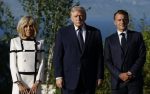 French President Emmanuel Macron (R) and his wife Brigitte Macron (L) welcome US President Donald J. Trump