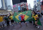 Brazil fans celebrate World Cup victory over Japan in Shibuya