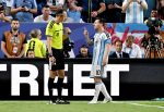 Lionel Messi of Argentina talks to referee Joao Pedro Silva Pinheiro