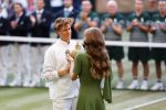 Jannik Sinner of Italy receives the trophy from Britain's Catherine, Princess of Wales