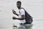 Thousands of migrants enter Spanish enclaves in North Africa