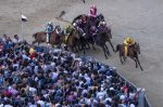 Jockey Giovanni Atzeni (R, in yellow), nicknamed 'Tittia',