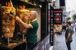 A man working at Turkish doner kebap