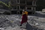 Nepal observes national day of mourning on 13th day after deadly flash floods