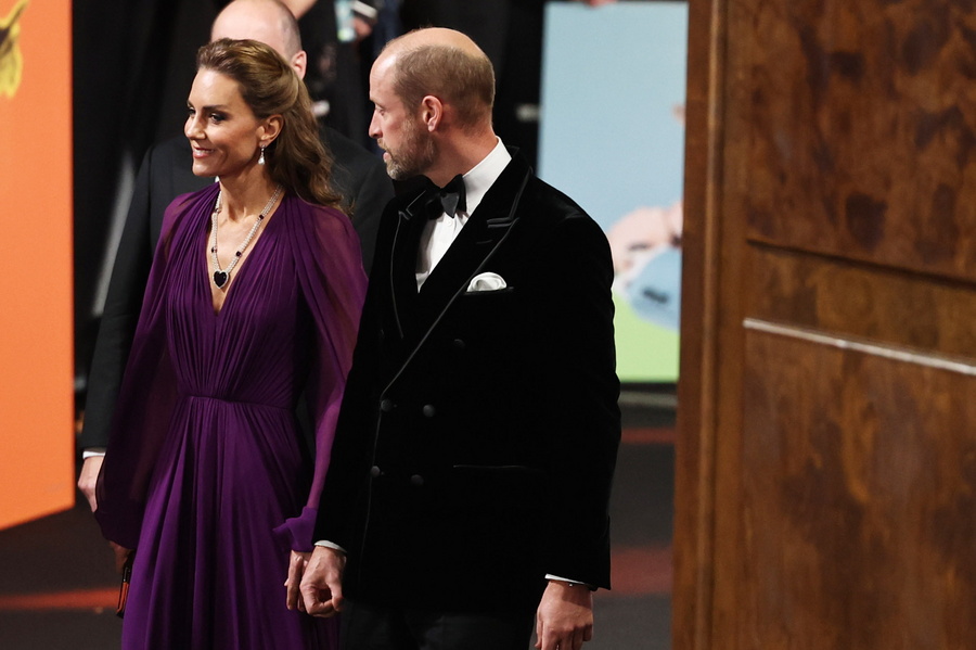 Britain’s Princess Catherine (L) and Prince William