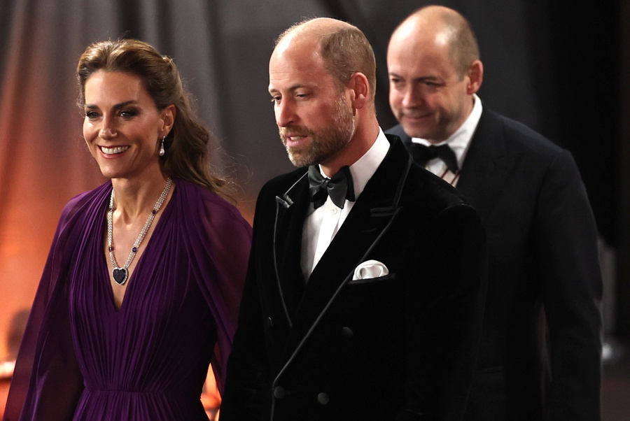 Britain’s Princess Catherine (L) and Prince William