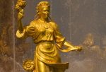 gold statue street performer monument pixabay